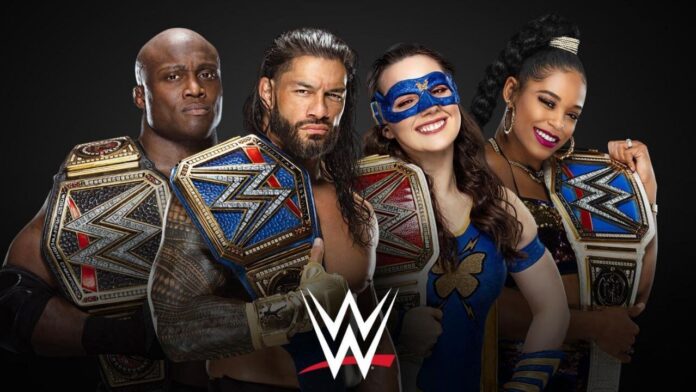 Die amtierenden Champions bei WWE freuen sich auf 2022 - Grafik: (c) WWE.